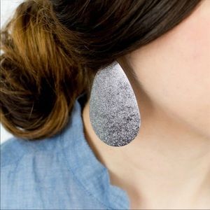 Metal tear drop statement earrings.